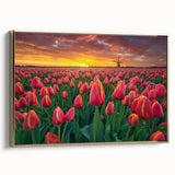 Framed canvas featuring a vintage-style landscape painting of a Dutch scenery in black and gold tones.