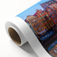 Art deco poster of a European scenery in muted blue and green tones on rolled canvas, ideal for nursery wall art.