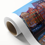 Art deco poster of a European scenery in muted blue and green tones on rolled canvas, ideal for nursery wall art.