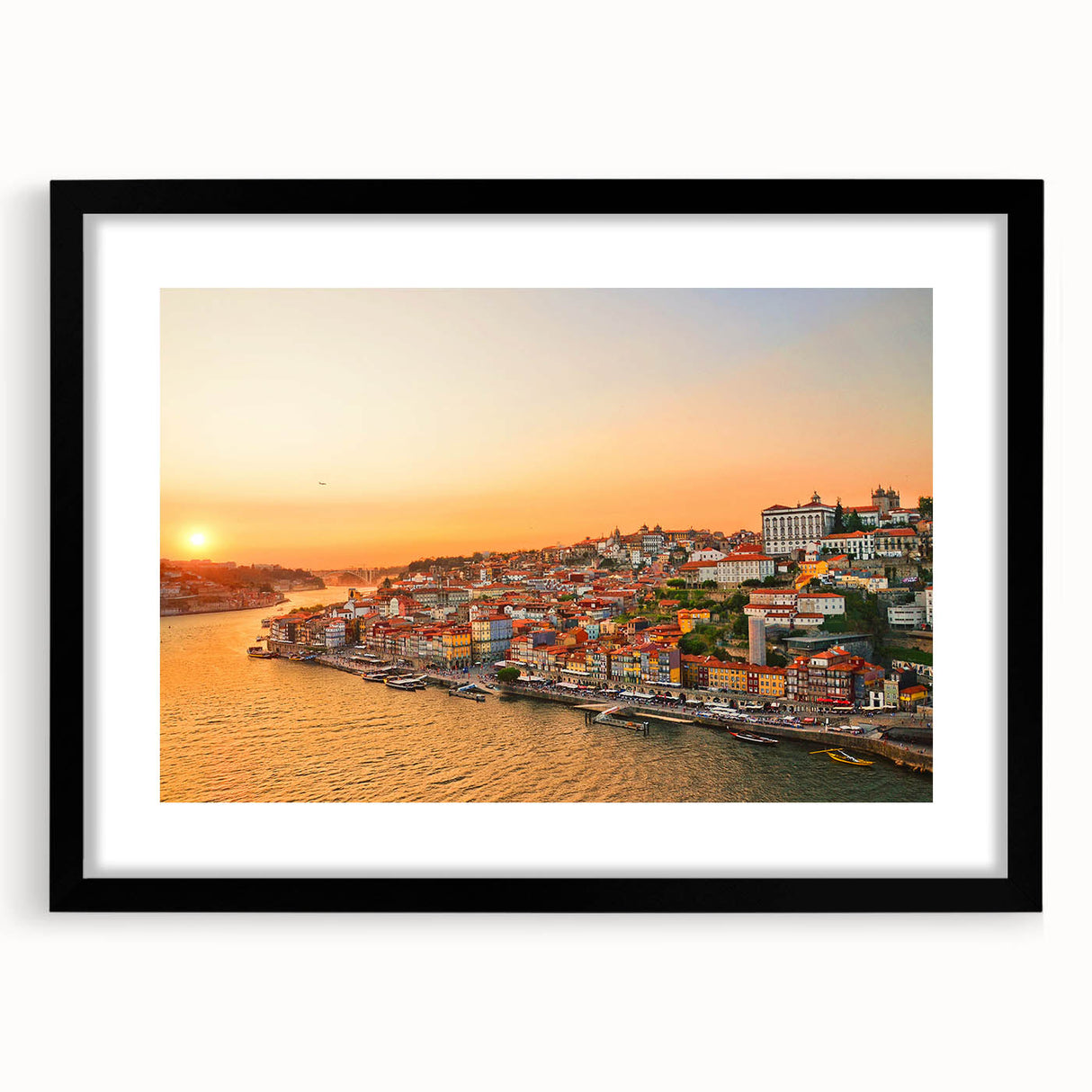 Extra large abstract art print of Porto scenery in vibrant colors on a black framed canvas, suitable for living room decor.