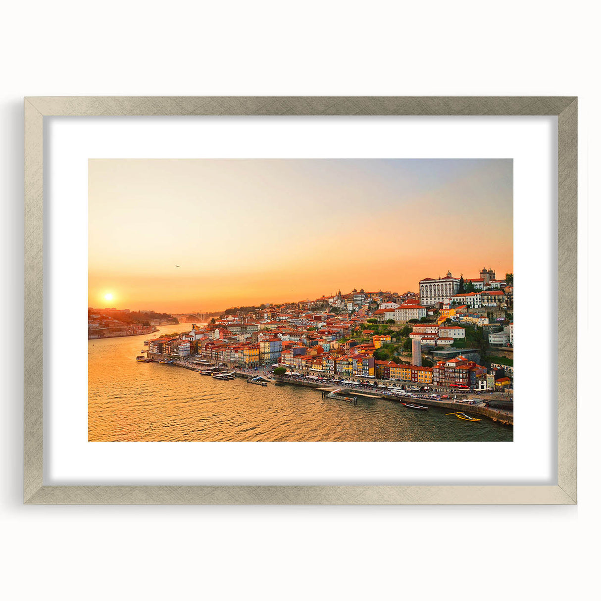 Abstract art print of Porto scenery in muted blue and gray tones on a framed silver canvas, suitable for dining room decor.