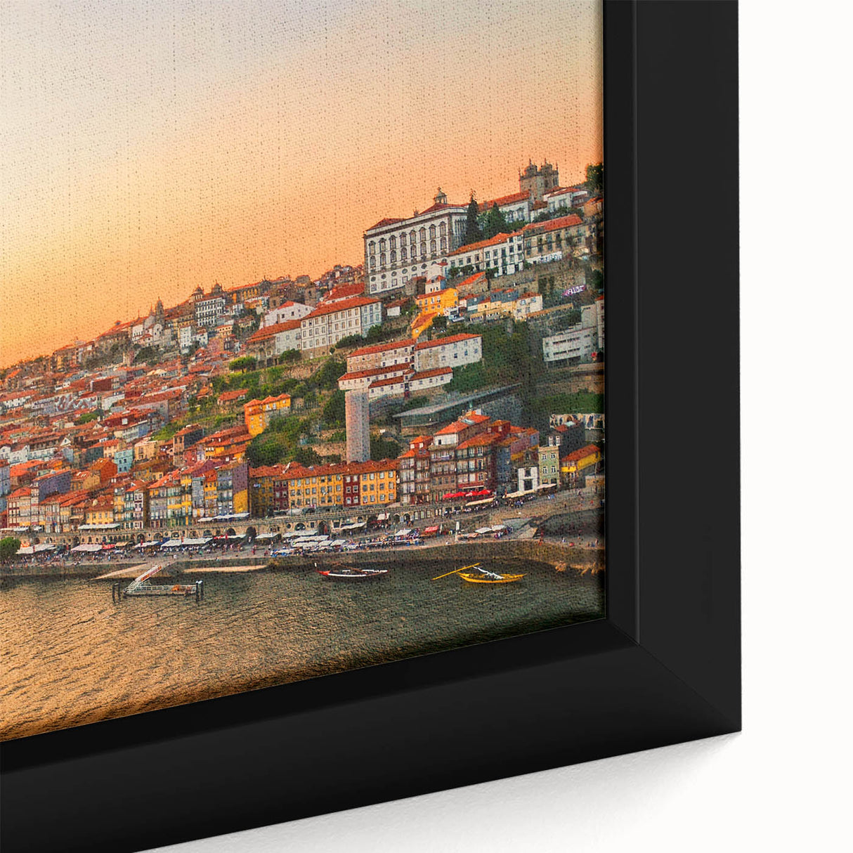 Close-up of a framed canvas featuring a textured depiction of Porto, Portugal in vibrant colors.