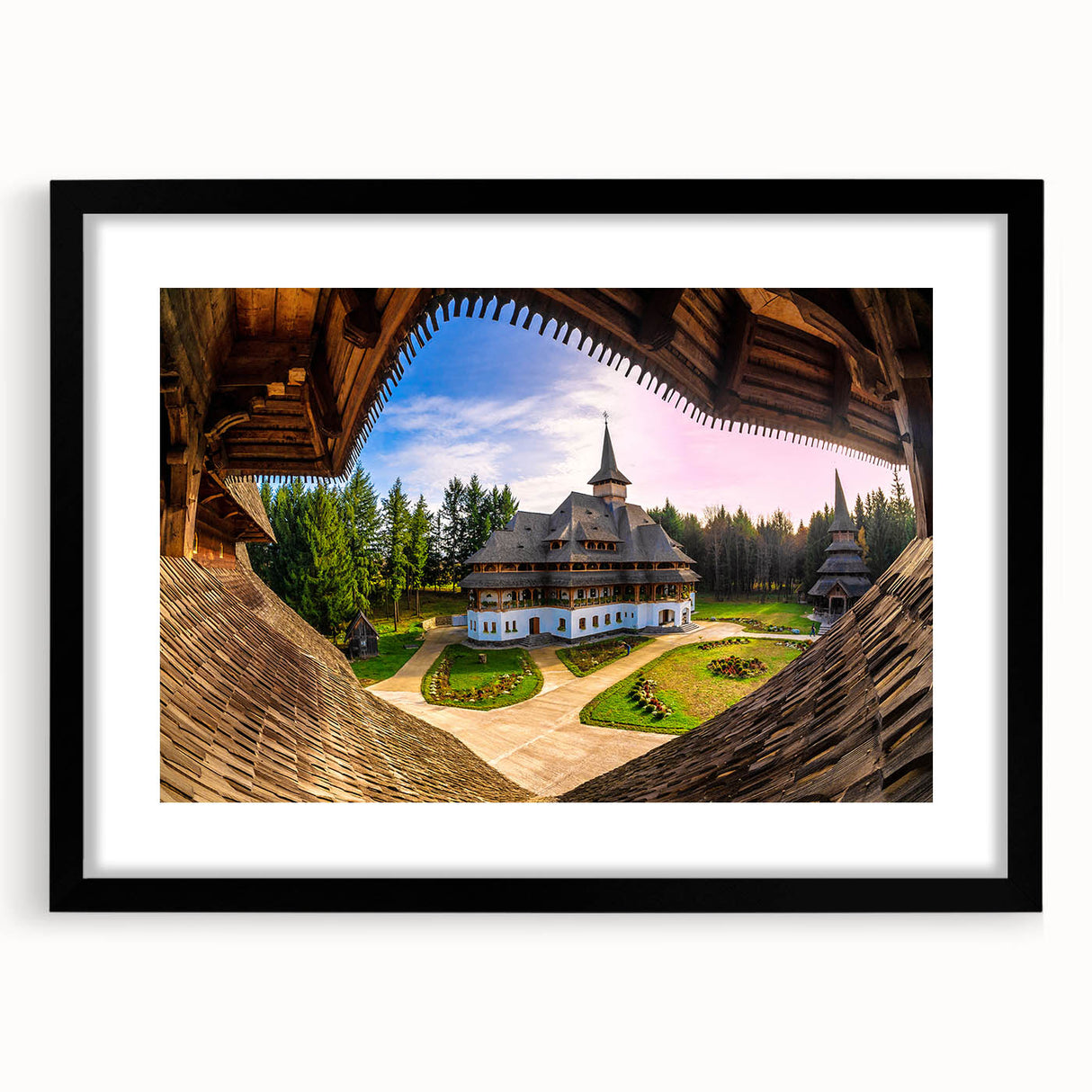 Extra large abstract art print of a colorful, textured European scenery on a black framed canvas.