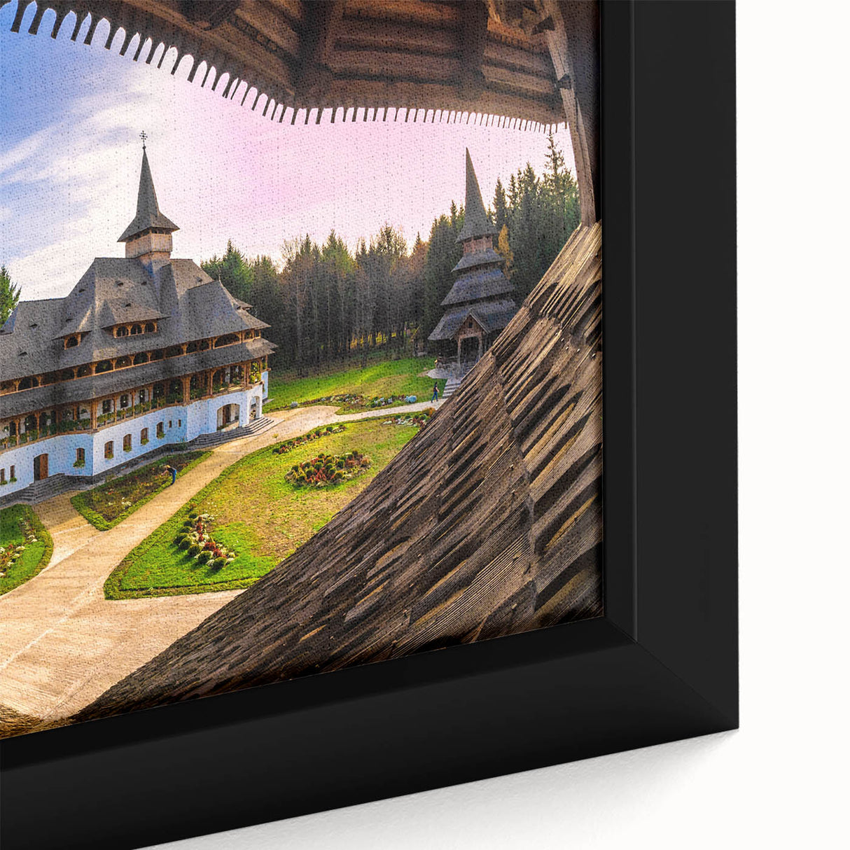 Extra large framed canvas featuring a black textured art scene of a Romanian landscape with vibrant colorful accents.