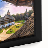 Extra large framed canvas featuring a black textured art scene of a Romanian landscape with vibrant colorful accents.