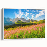 Vintage poster art of a European scenery on a large framed canvas, featuring vibrant colors against a black background.