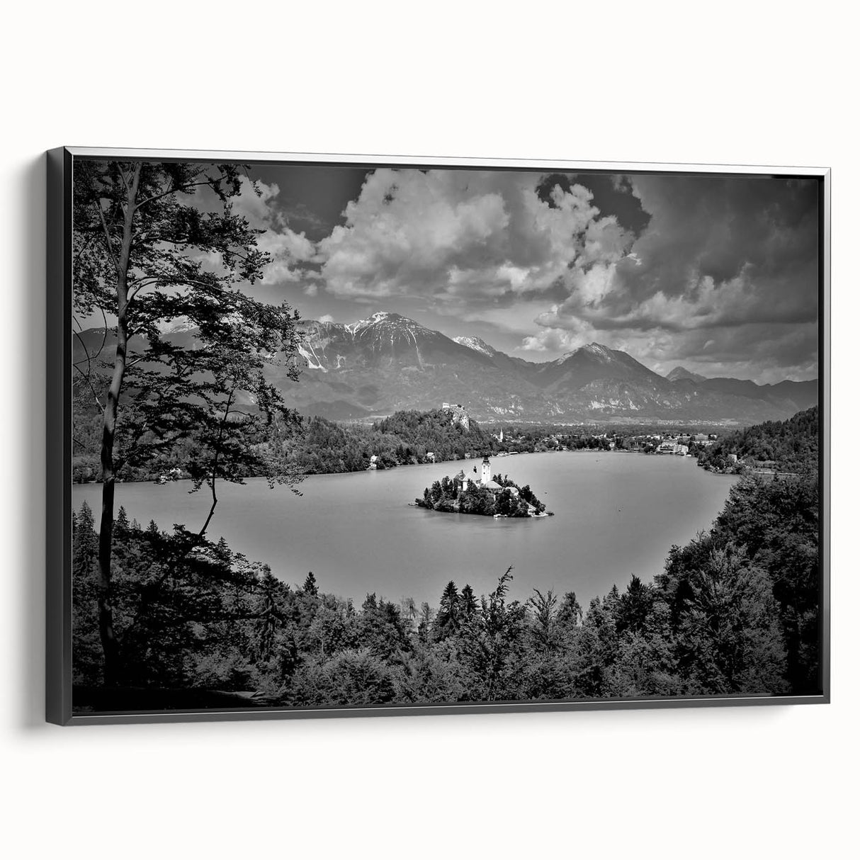 Black and white framed canvas of a Slovenian landscape, ideal for bedroom wall decor.
