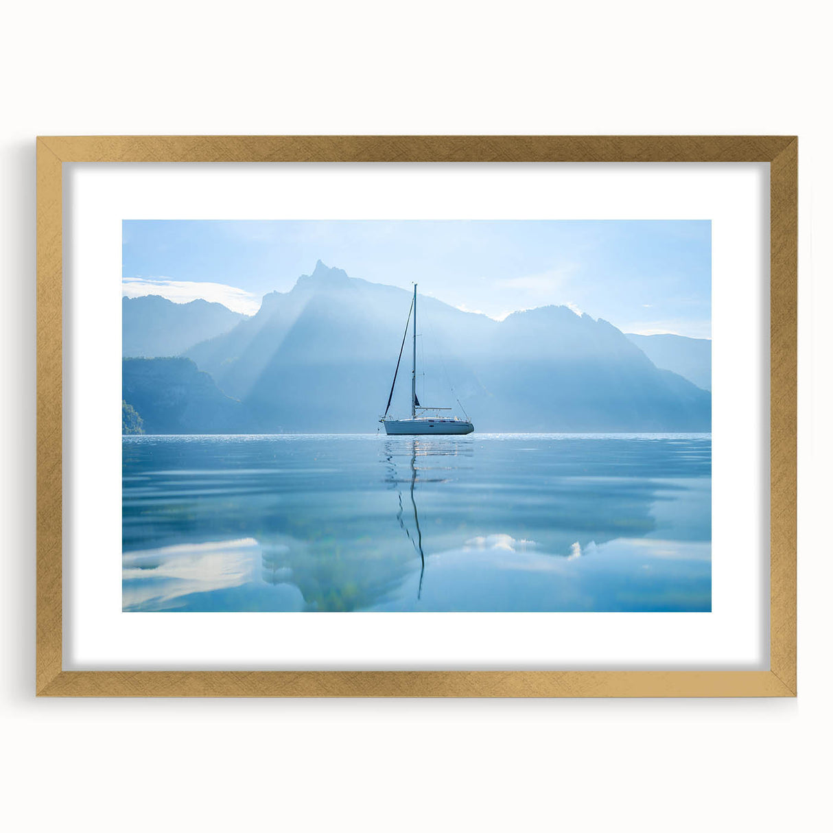 Extra large wall art featuring an abstract print of Geneva's scenery in textured shades of blue and gray, framed in gold.