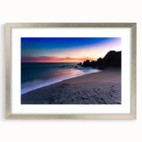 Textured abstract art print of Cabo San Lucas scenery in muted earth tones, framed in silver, suitable for bedroom decor.