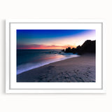 Abstract art print of Cabo San Lucas scenery in muted blue and white tones on a framed white mat.