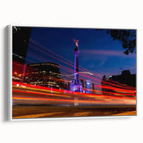 Vintage poster art of Mexico City on framed canvas, featuring colorful details on a black background.