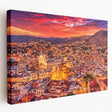 Side view of a stretched canvas featuring a vibrant street scene in Guanajuato, Mexico, with colorful buildings.