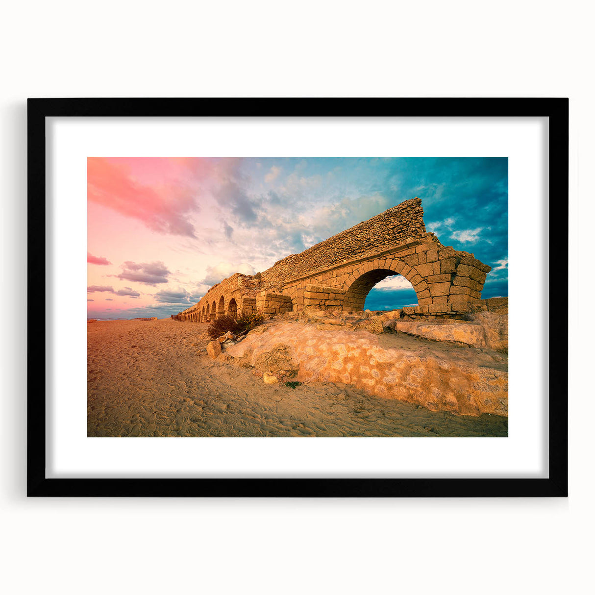 Extra large abstract art print of a Middle Eastern scenery in vibrant colors on a textured canvas, framed in black.