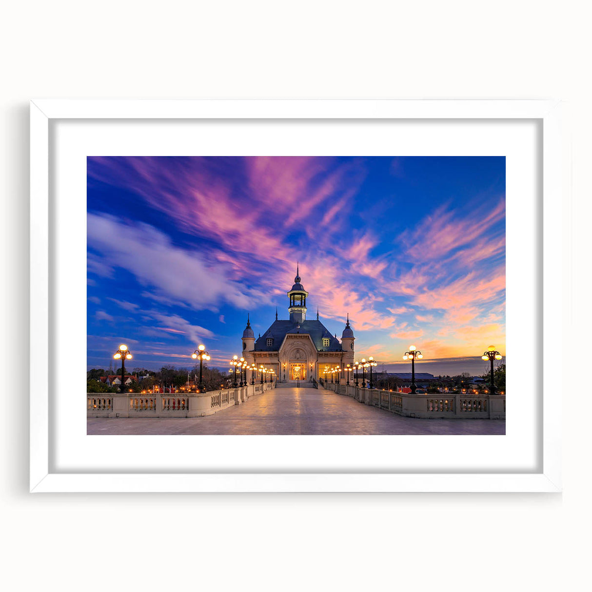 Abstract art print of Buenos Aires skyline in muted blue and gray tones, framed with a white mat.