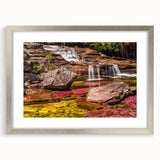 Textured abstract art print depicting a vibrant Colombian landscape in a silver frame, ideal for bedroom art.
