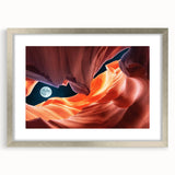 Textured art print of Antelope Canyon in Arizona, featuring rich orange and red hues on a framed silver mat.
