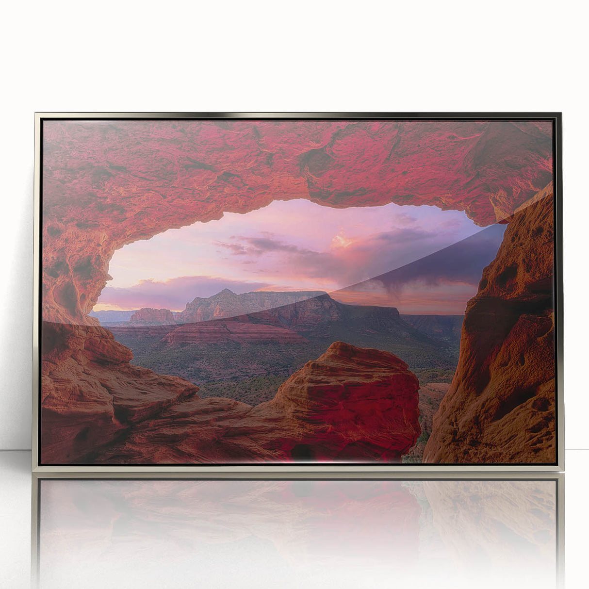 Mid-century modernist art depicting Sedona, Arizona landscape in muted earth tones on a silver-framed acrylic print.