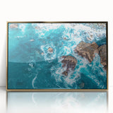 Large art print of Big Sur coastline in muted earth tones, framed in gold acrylic, embodying mid-century modernist style.