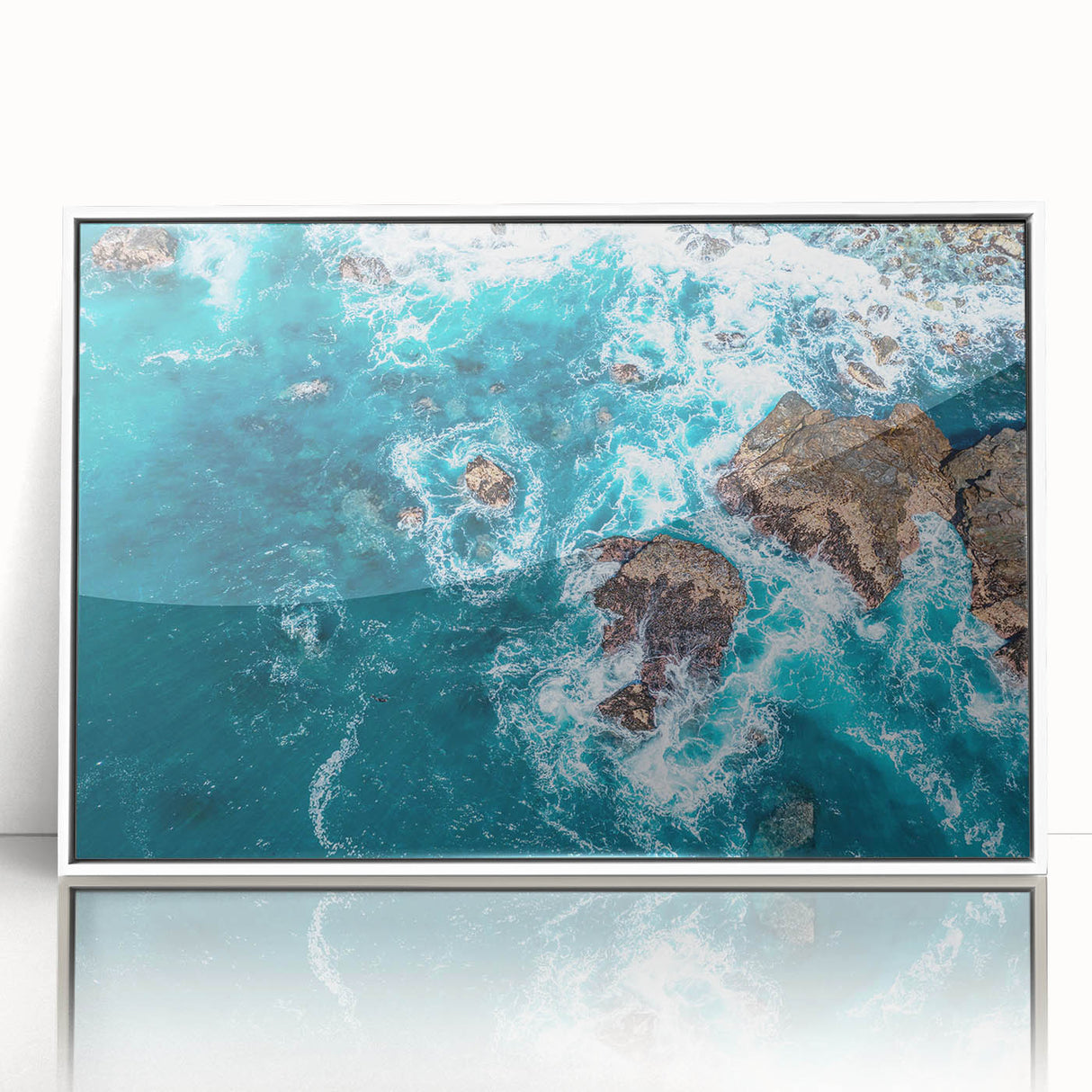 Acrylic print of Big Sur California scenery in muted earth tones, framed in white, suited for modern art wall decor.