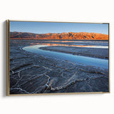 Framed canvas wall art depicting Death Valley landscape in muted earth tones, ideal for bedroom ambiance.