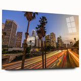Large abstract wall art of Los Angeles skyline in muted gray and blue tones on acrylic glass.