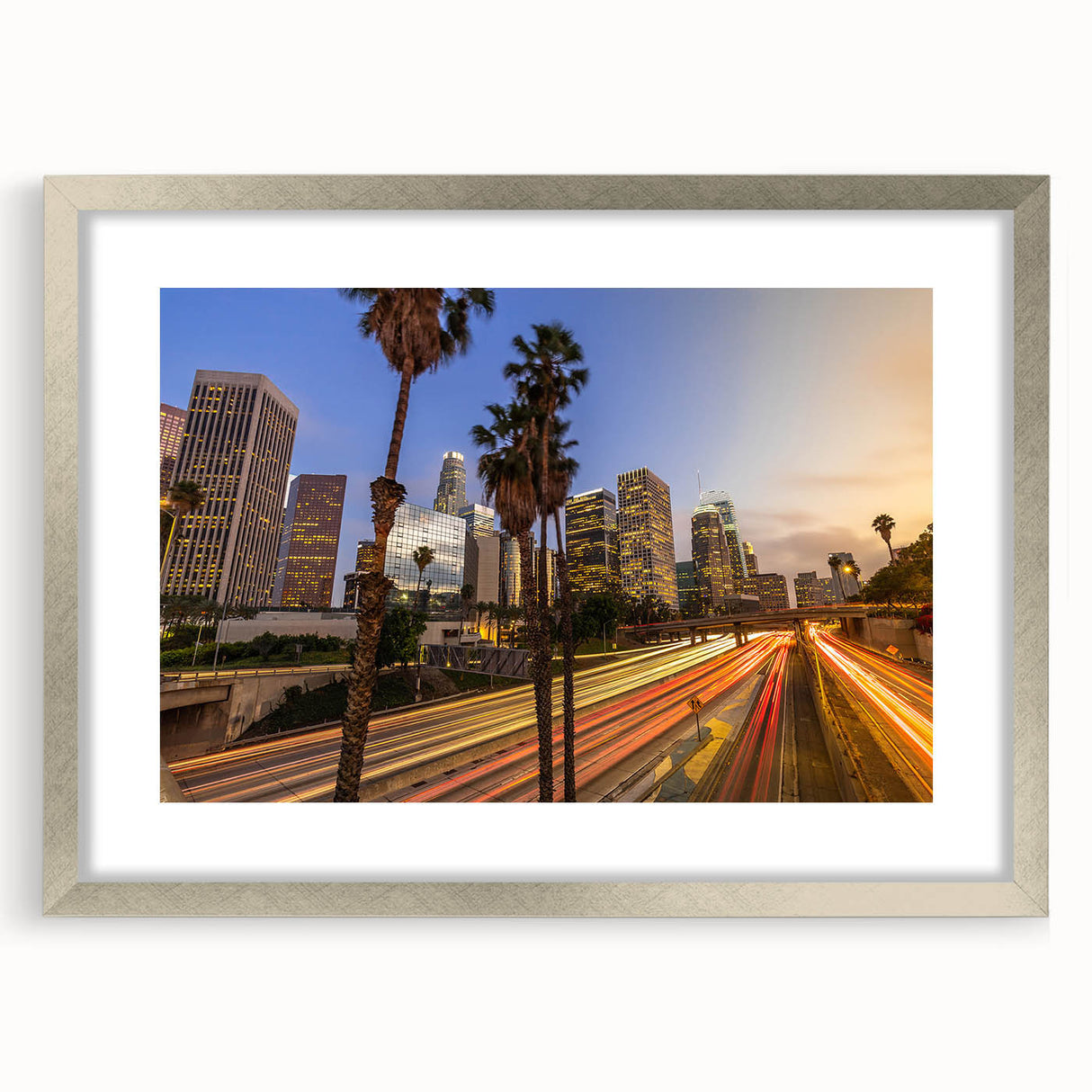 Textured art print of abstract Los Angeles skyline in muted gray and blue tones on a framed canvas.
