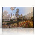 Large abstract wall art of Los Angeles skyline in muted gray and blue tones on a framed acrylic.