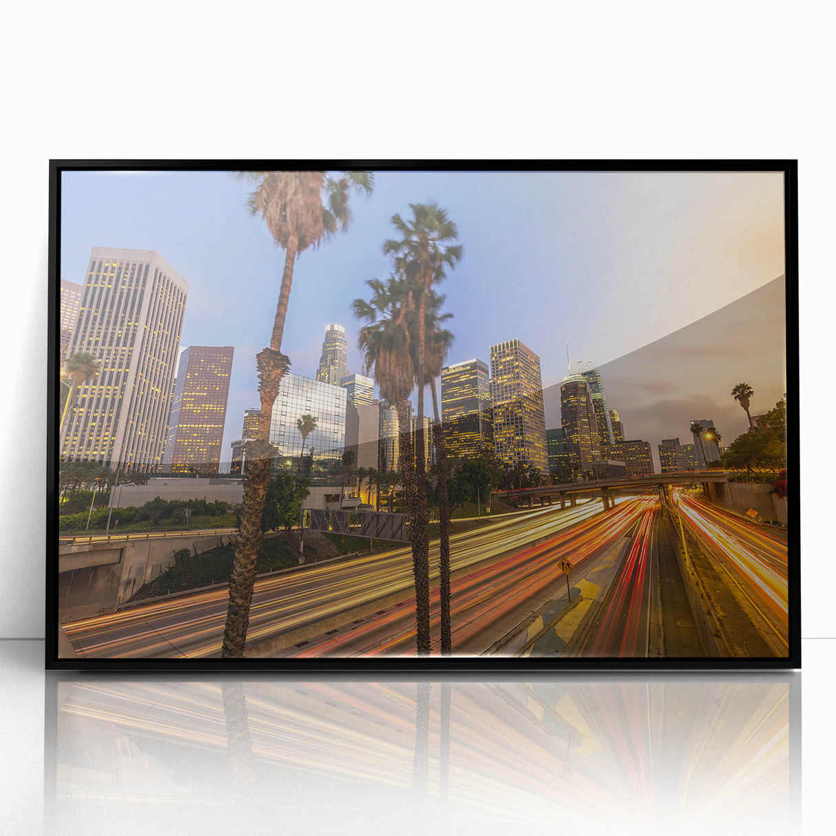 Large abstract wall art of Los Angeles skyline in muted gray and blue tones on a framed acrylic.