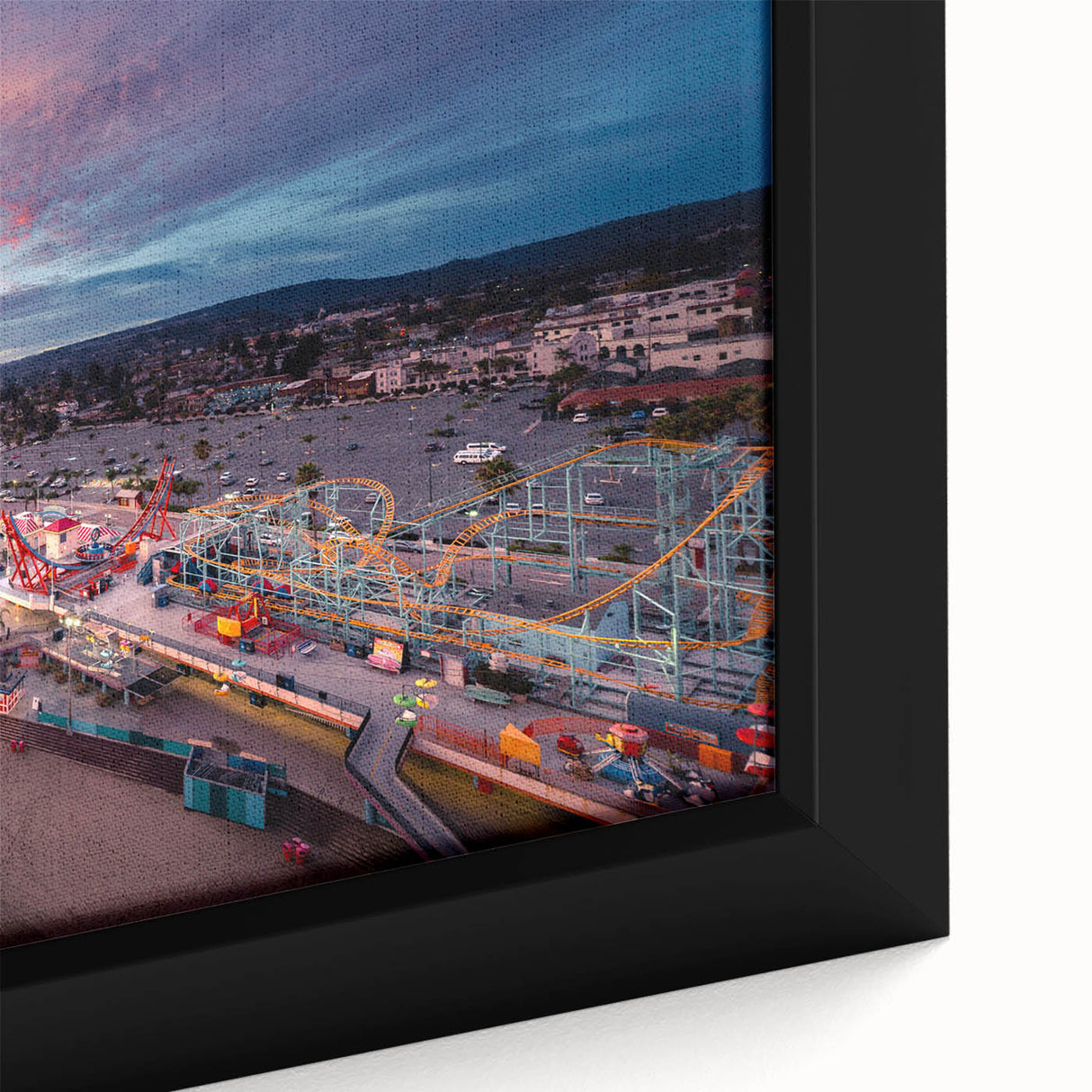 Close-up of textured black wall art featuring a vibrant, colorful Santa Cruz scene on an extra large framed canvas.