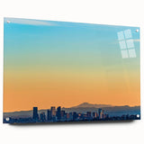 Abstract depiction of Denver skyline in muted blue and gray tones on large acrylic glass.