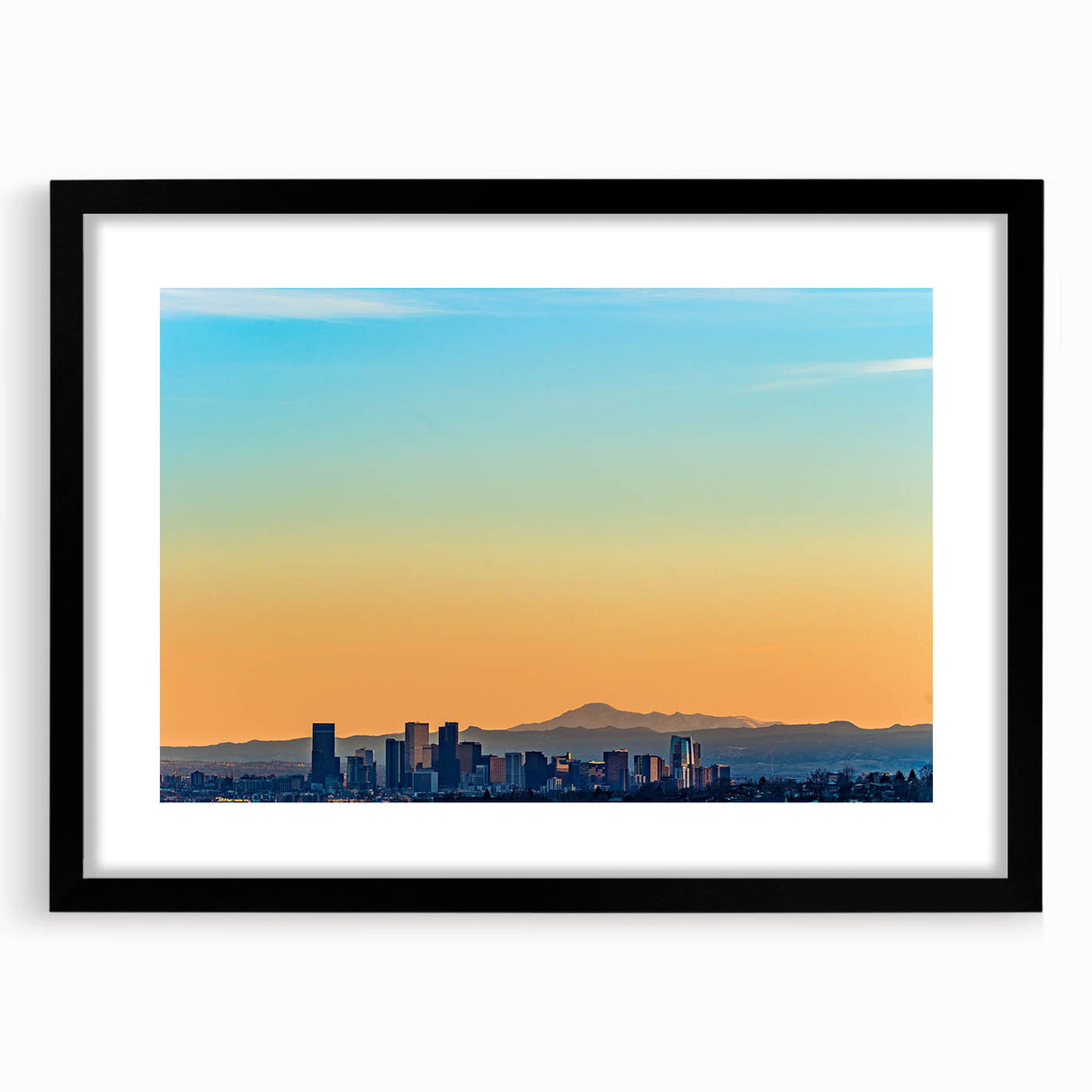 Abstract art print of Denver skyline in vibrant colors on a large textured canvas, ideal for living room decor.