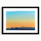 Abstract art print of Denver skyline in vibrant colors on a large textured canvas, ideal for living room decor.