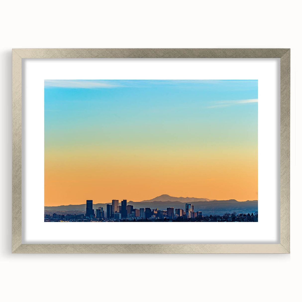 Textured abstract art print of Denver skyline in muted earth tones, framed in silver, ideal for bedroom art.
