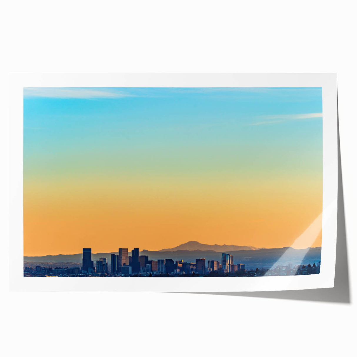 Extra large rolled print of Denver skyline in vibrant twilight hues, ideal for dining room wall art.