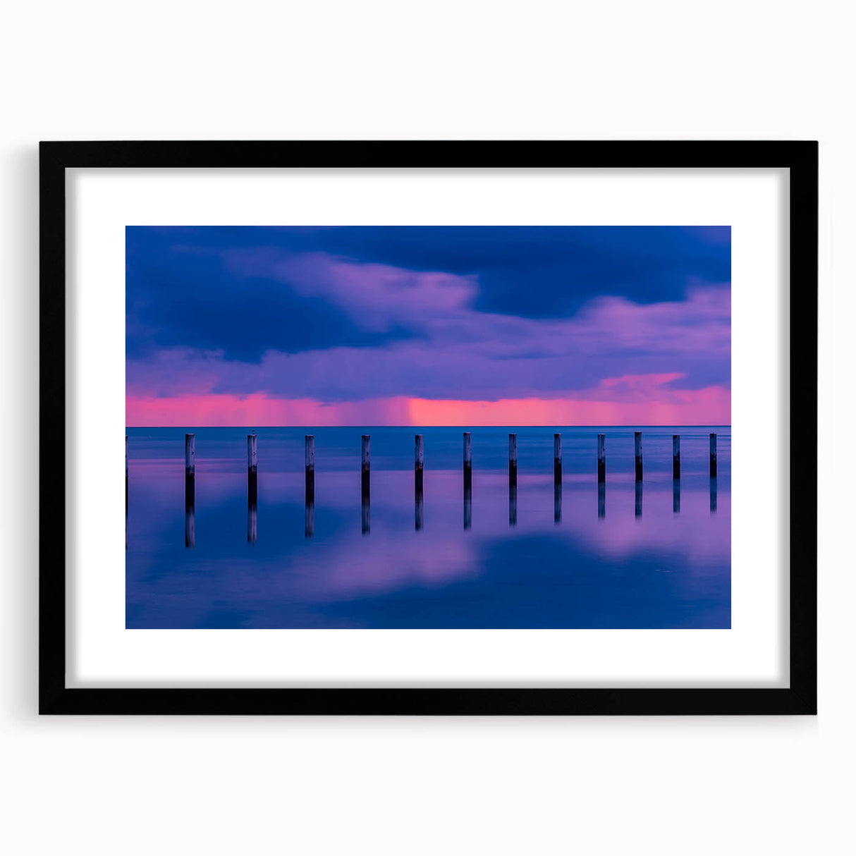 Extra large abstract art print of the Florida Keys in vibrant colors on a textured canvas, framed in black.