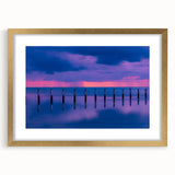 Abstract art print of Florida Keys in textured style with muted blue and green tones on a large framed canvas.