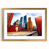 Extra large abstract art print of Chicago skyline in muted gold and blue tones on a framed canvas.