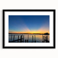 Colorful abstract art print of Annapolis scenery in a black frame, featuring textured brush strokes.