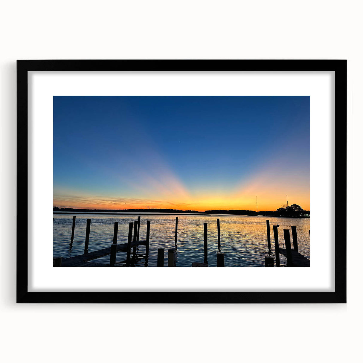 Colorful abstract art print of Annapolis scenery in a black frame, featuring textured brush strokes.