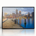 Large abstract wall art depicting a stylized Boston skyline in muted blue and grey tones, framed in black acrylic.