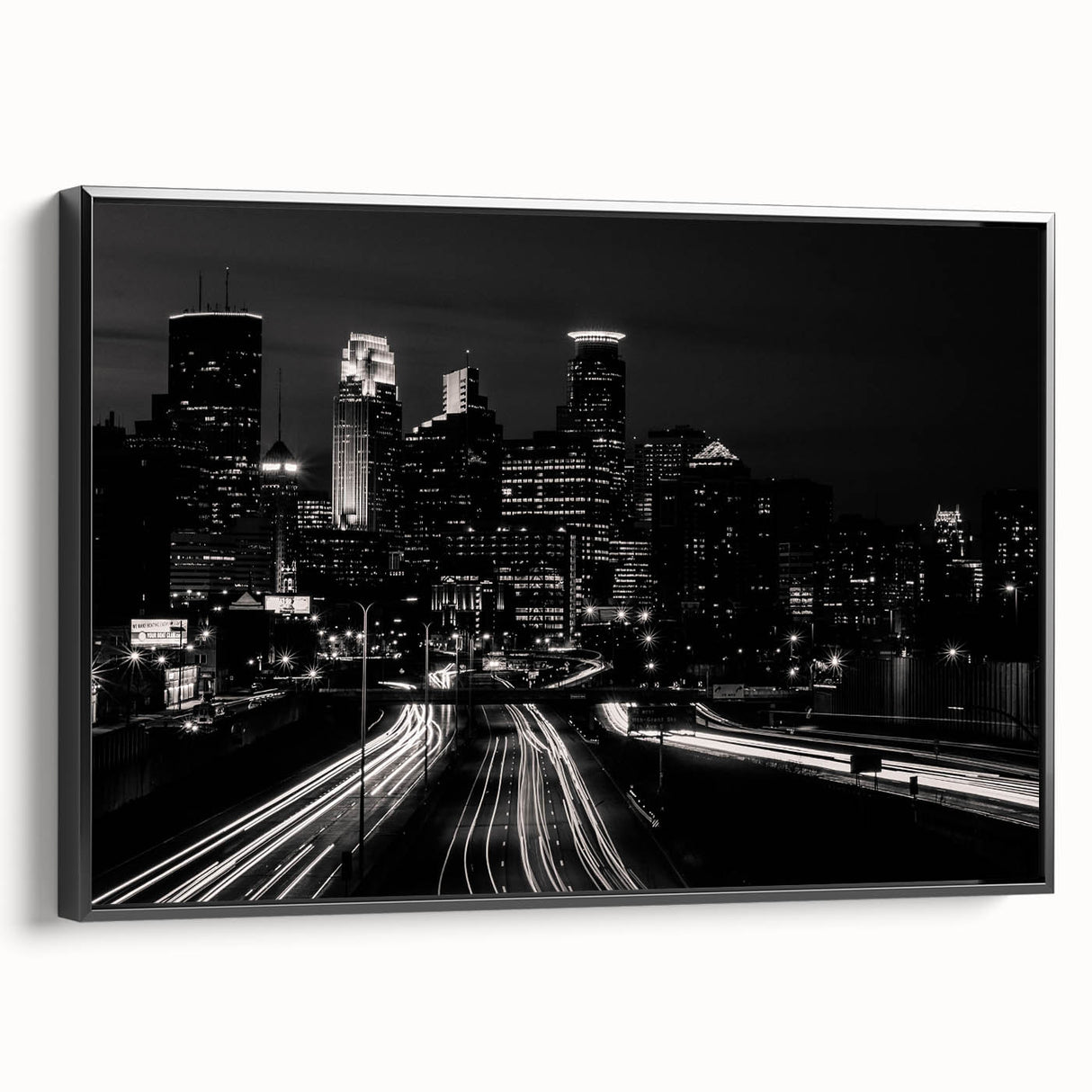 Black and white framed canvas of Minneapolis skyline, ideal for bedroom wall art with a vintage poster style.