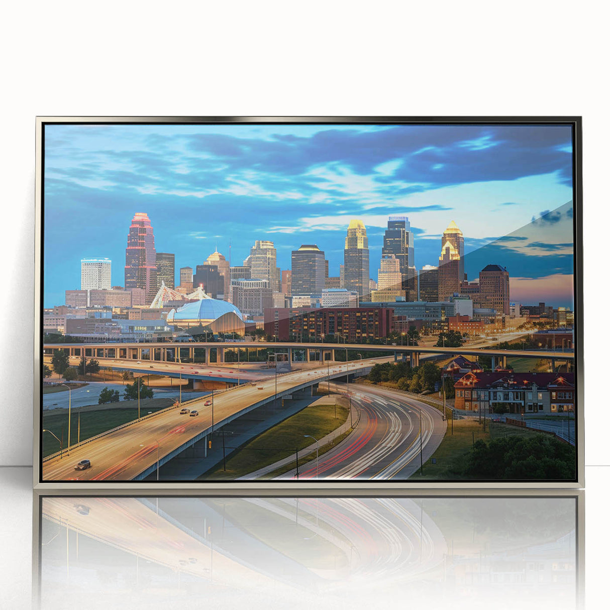 Mid-century modernist art of Kansas City skyline in muted gray and blue tones on framed acrylic.