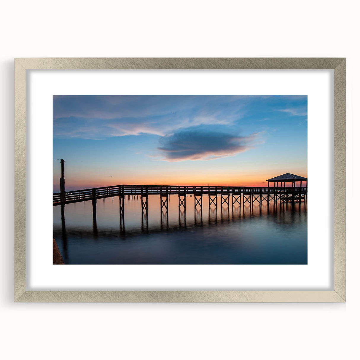 Textured art print of St. Louis skyline in muted gray tones on a framed silver mat, ideal for bedroom art.