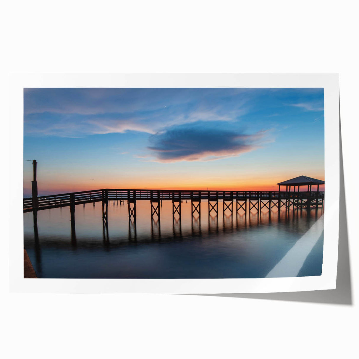 Rolled print of St. Louis skyline with muted blue and gray tones, ideal for art wall dining room decor.