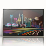 Mid-century modernist art depicting the Las Vegas skyline in vibrant colors, framed in silver acrylic.