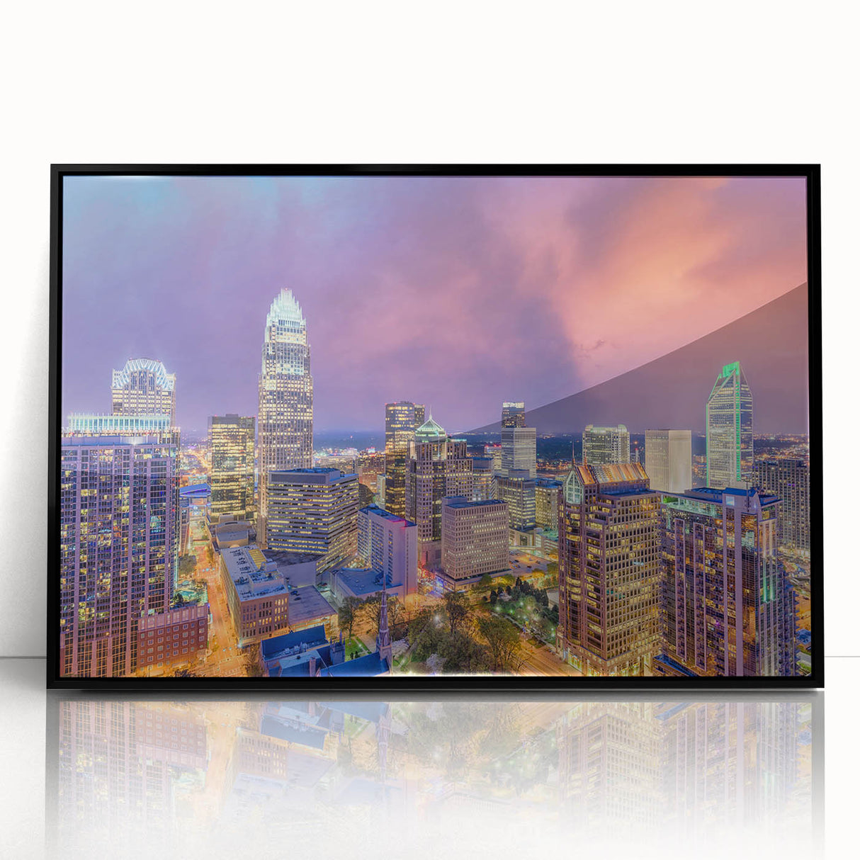 Large abstract wall art of Charlotte, North Carolina, in muted gray and blue tones on framed acrylic.