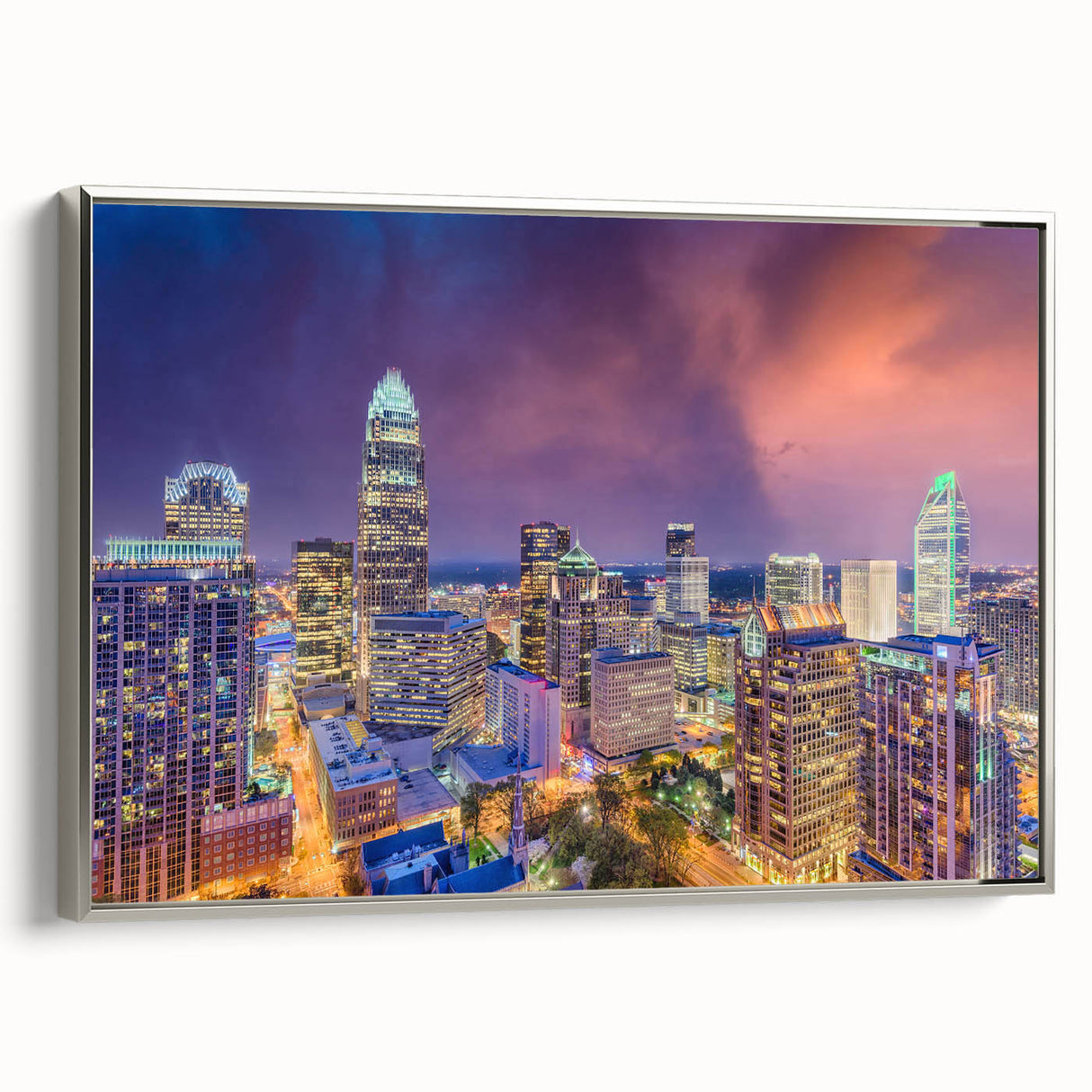 Framed canvas featuring a colorful landscape painting of the Charlotte skyline, ideal for modern living room decor.