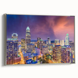 Framed canvas featuring a colorful landscape painting of the Charlotte skyline, ideal for modern living room decor.