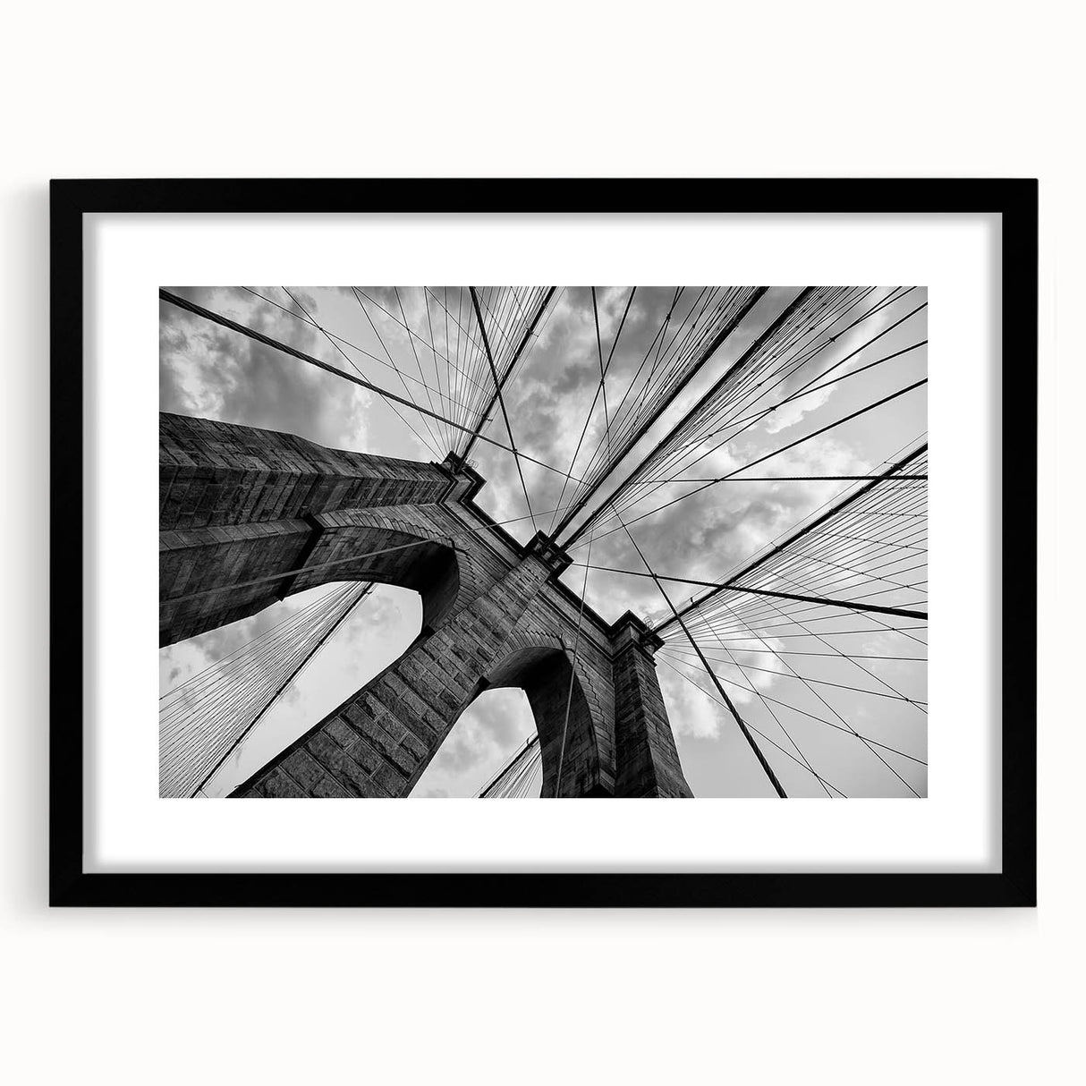 Extra large, textured abstract art print of Brooklyn Bridge in colorful hues on a black framed mat.