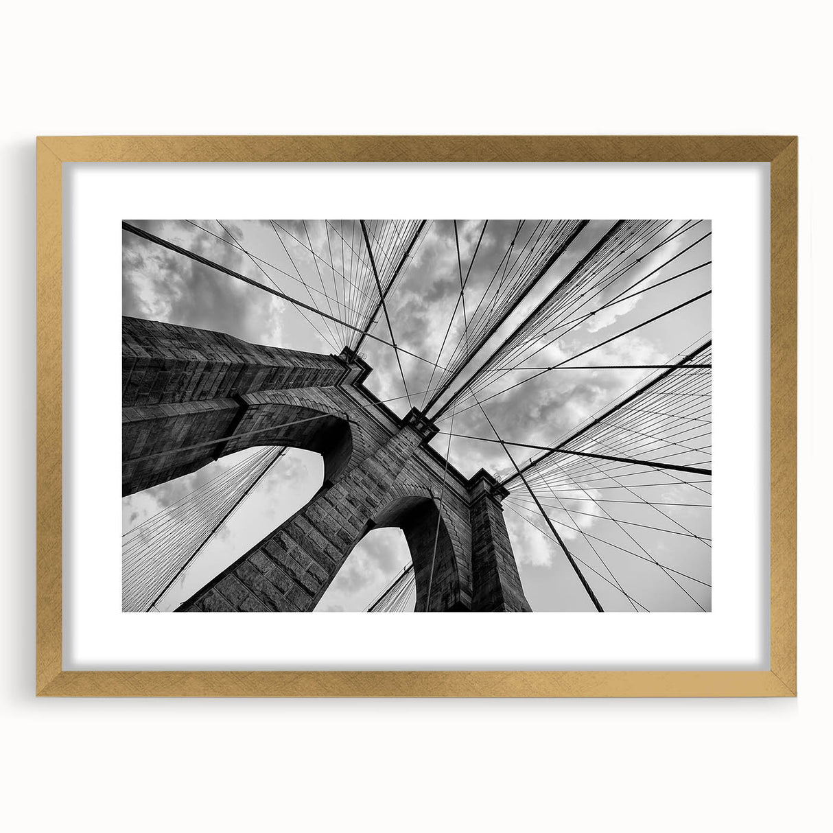 Extra large wall art featuring a textured abstract print of the Brooklyn Bridge in muted gray and gold tones on a framed…